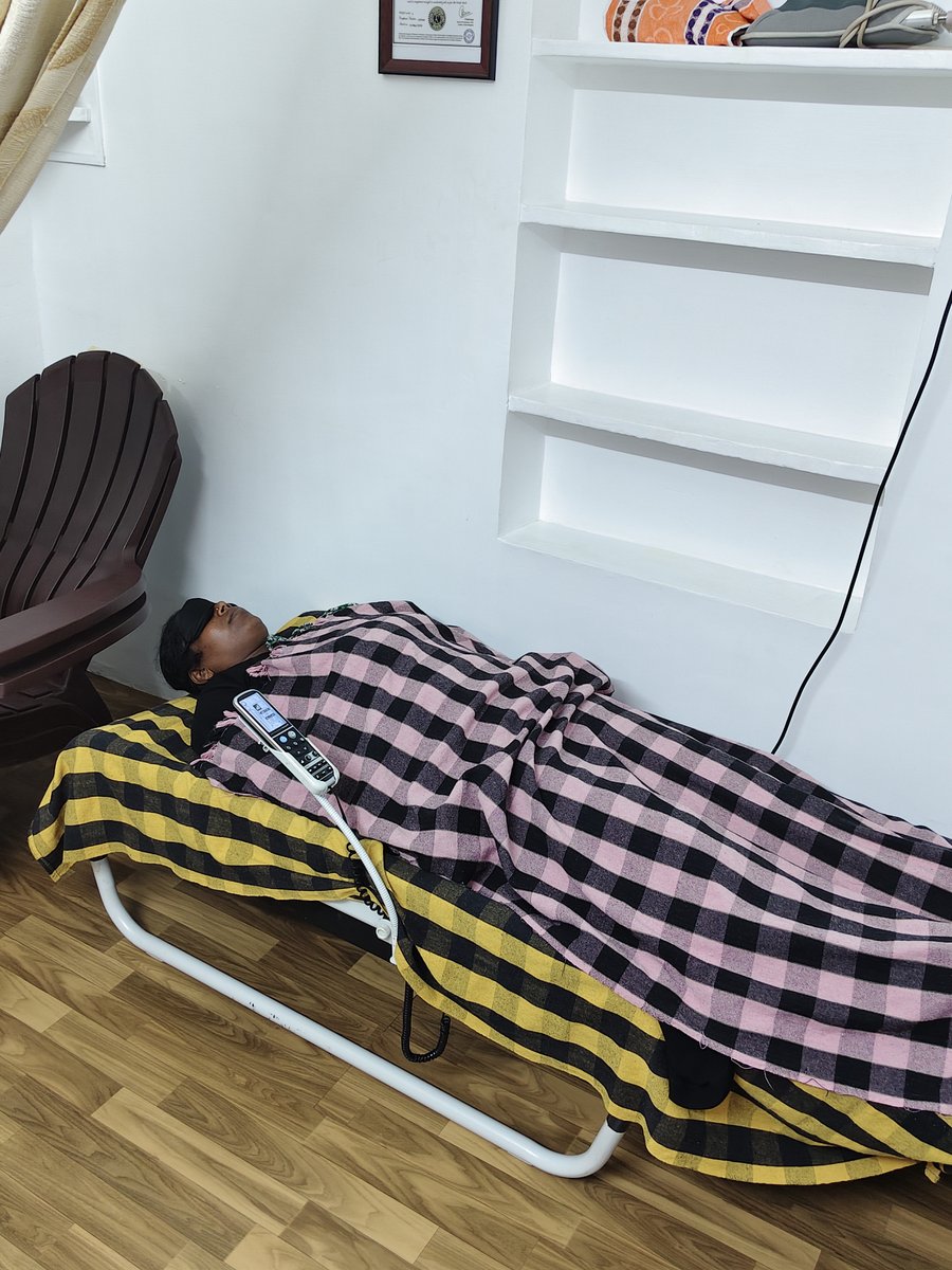 Automated spinal thermal decompression and acupressure therapy suite in session
